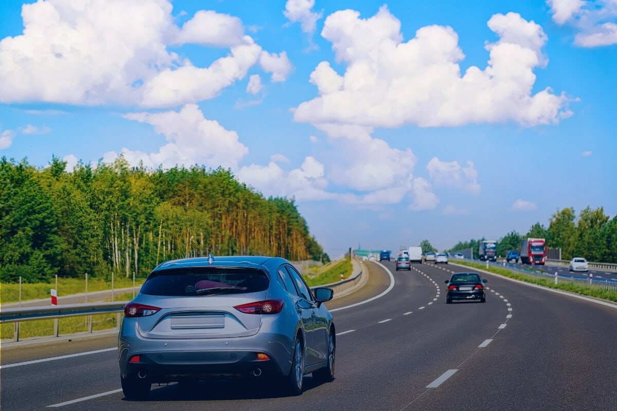 cars driving on highway cars driving on highway